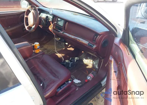 1999 Buick Park Avenue Ultra из США, поврежденный, VIN 1G4CU5218X4642520